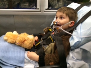 The EMS staff gave him an adorable teddy bear.