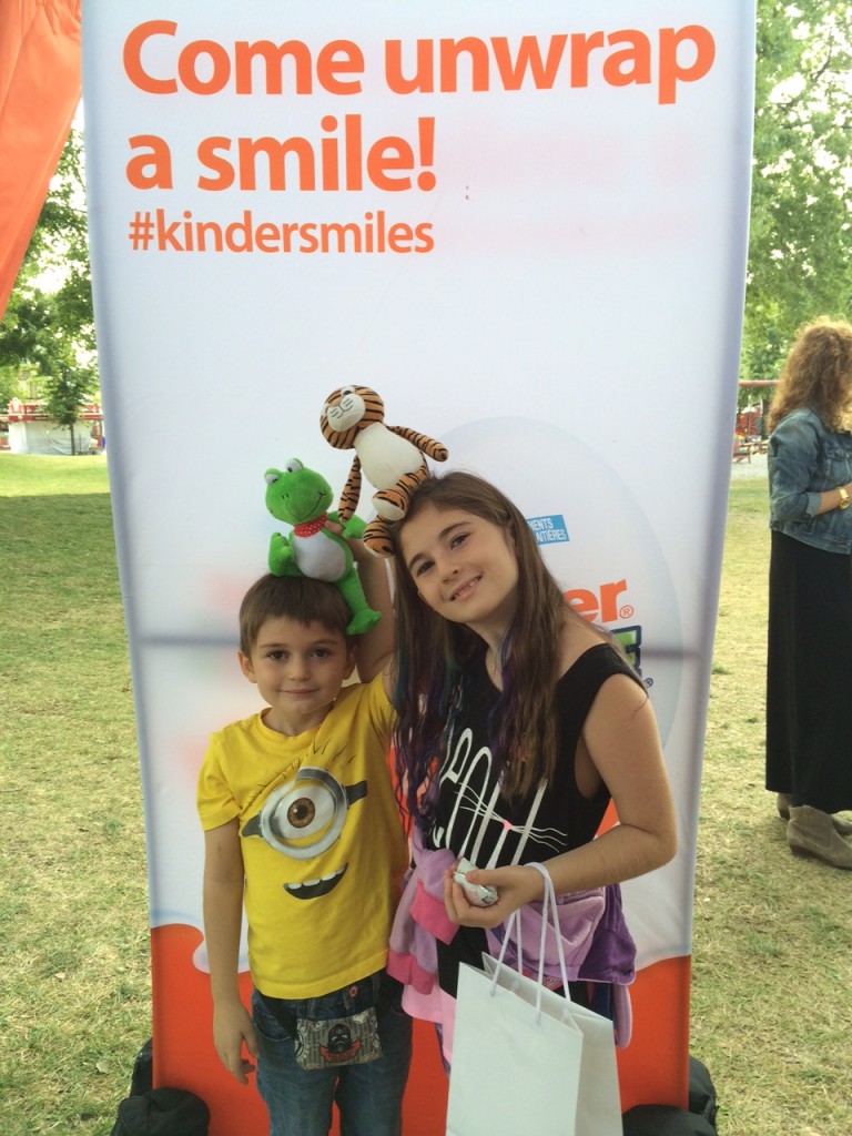 Unwrap a smile at at the Kinder booth at the CNE